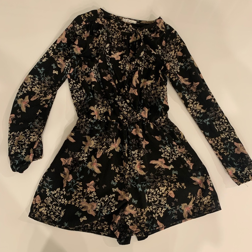 On the Road black romper with florals and birds.